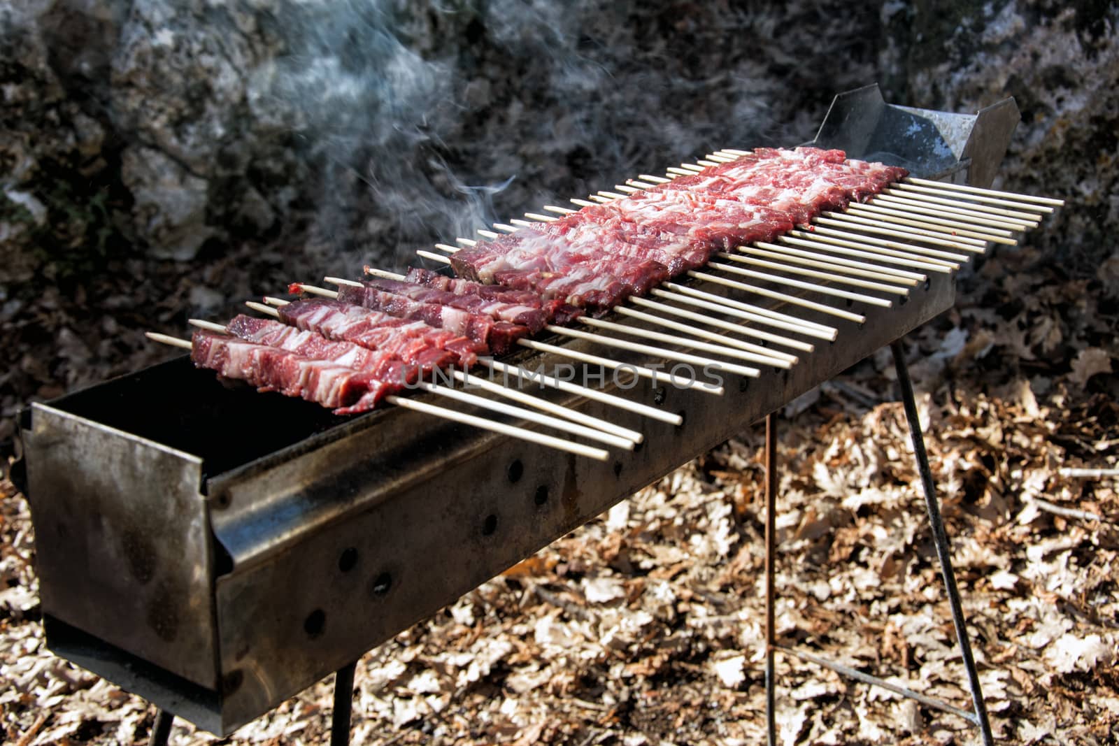 Arrosticini on the grill, Abruzzi skewers of sheep cooked on the grate and on a special brazier.