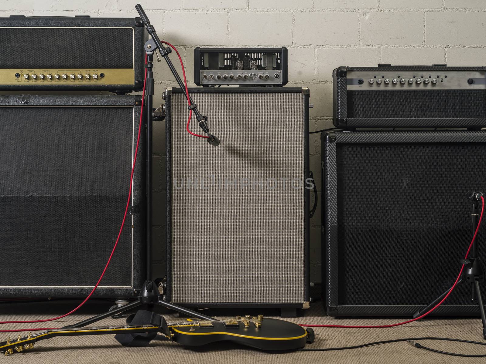 Guitar amplifiers in recording studio by sumners