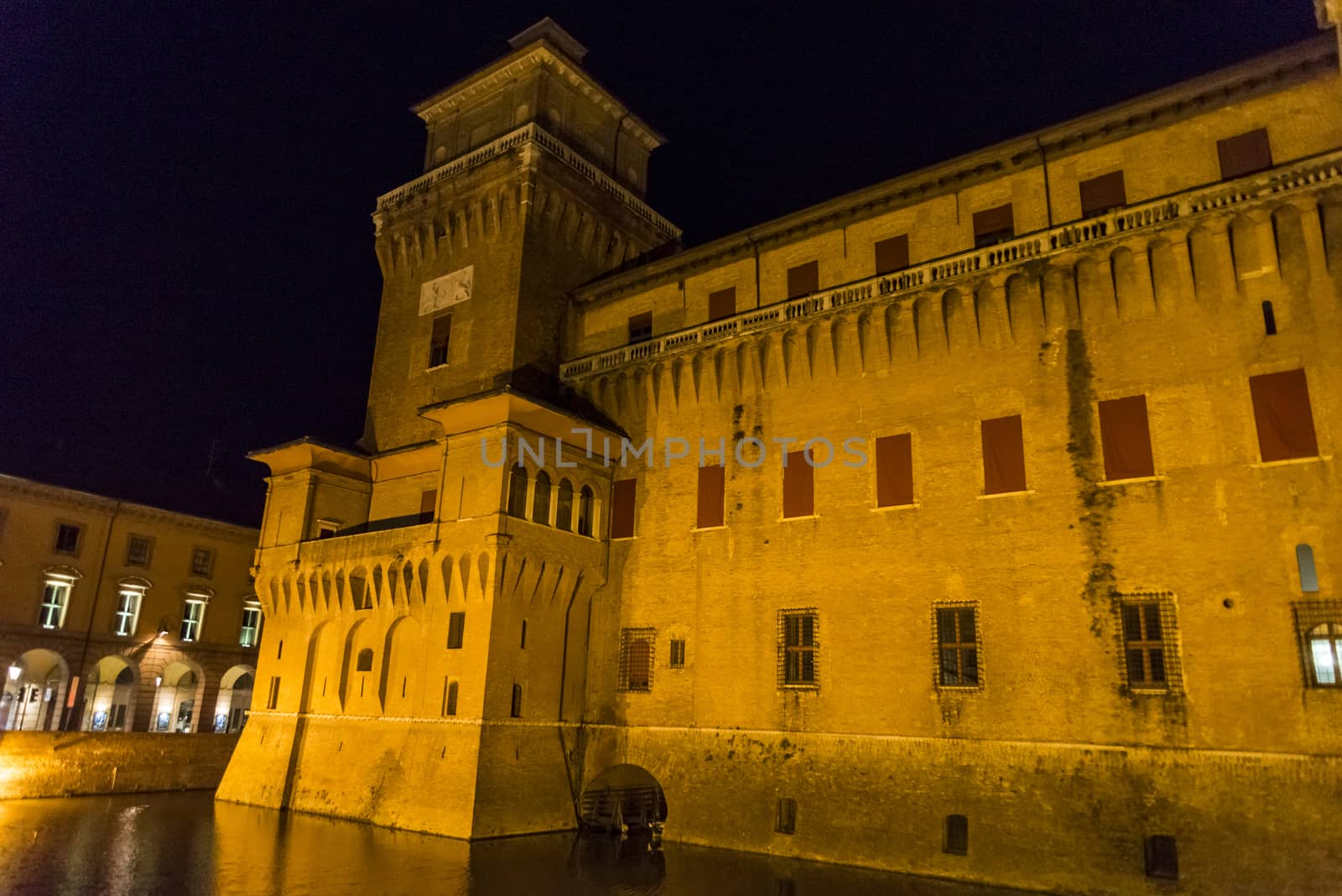 Night view of the Estense castle in Ferrara, Emilia Romagna, Italy
