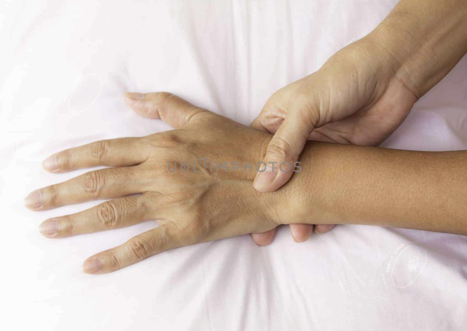 hand massage in the salon on a white background closeup
