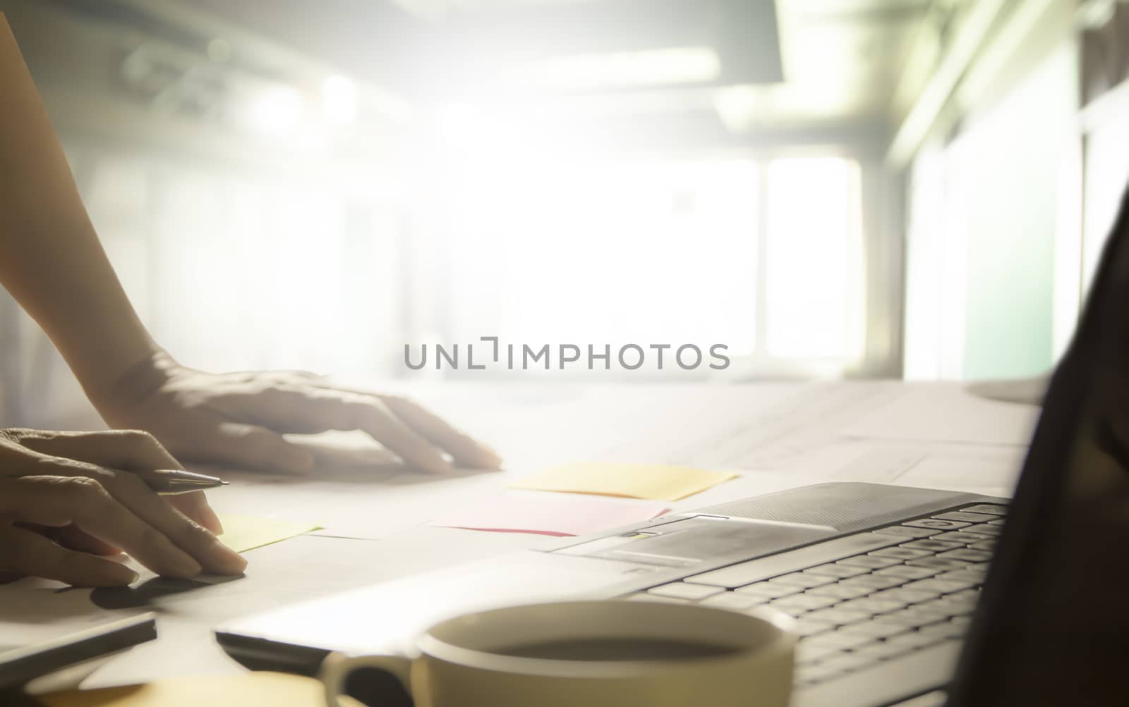 Businessman process. Businessman working the project and laptop on table soft focus
