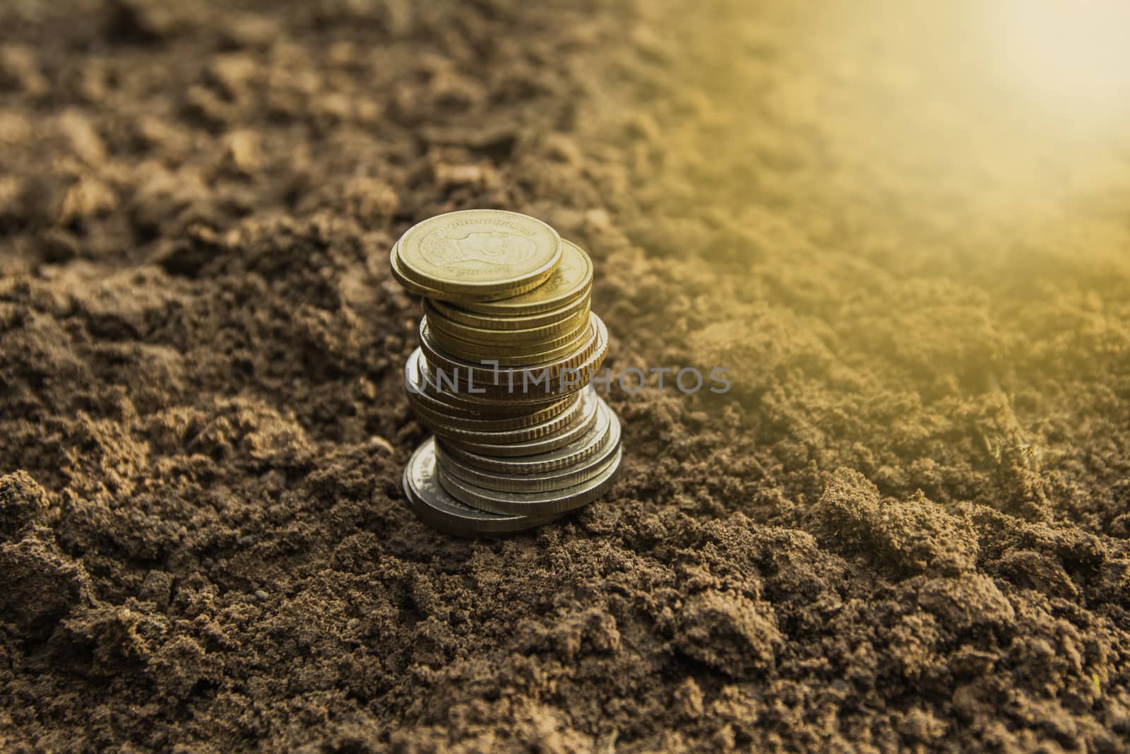Close-up coins save money concept with stack money coin for growing your business
