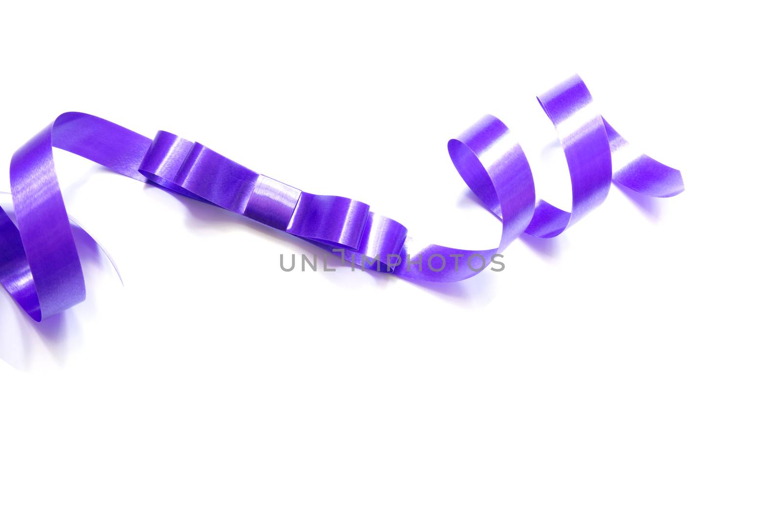 the spiral purple ribbon isolated on white background.