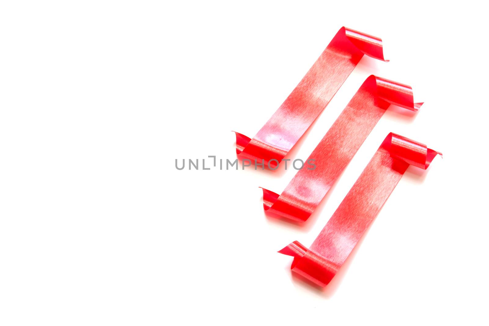 the spiral red ribbon isolated on white background.