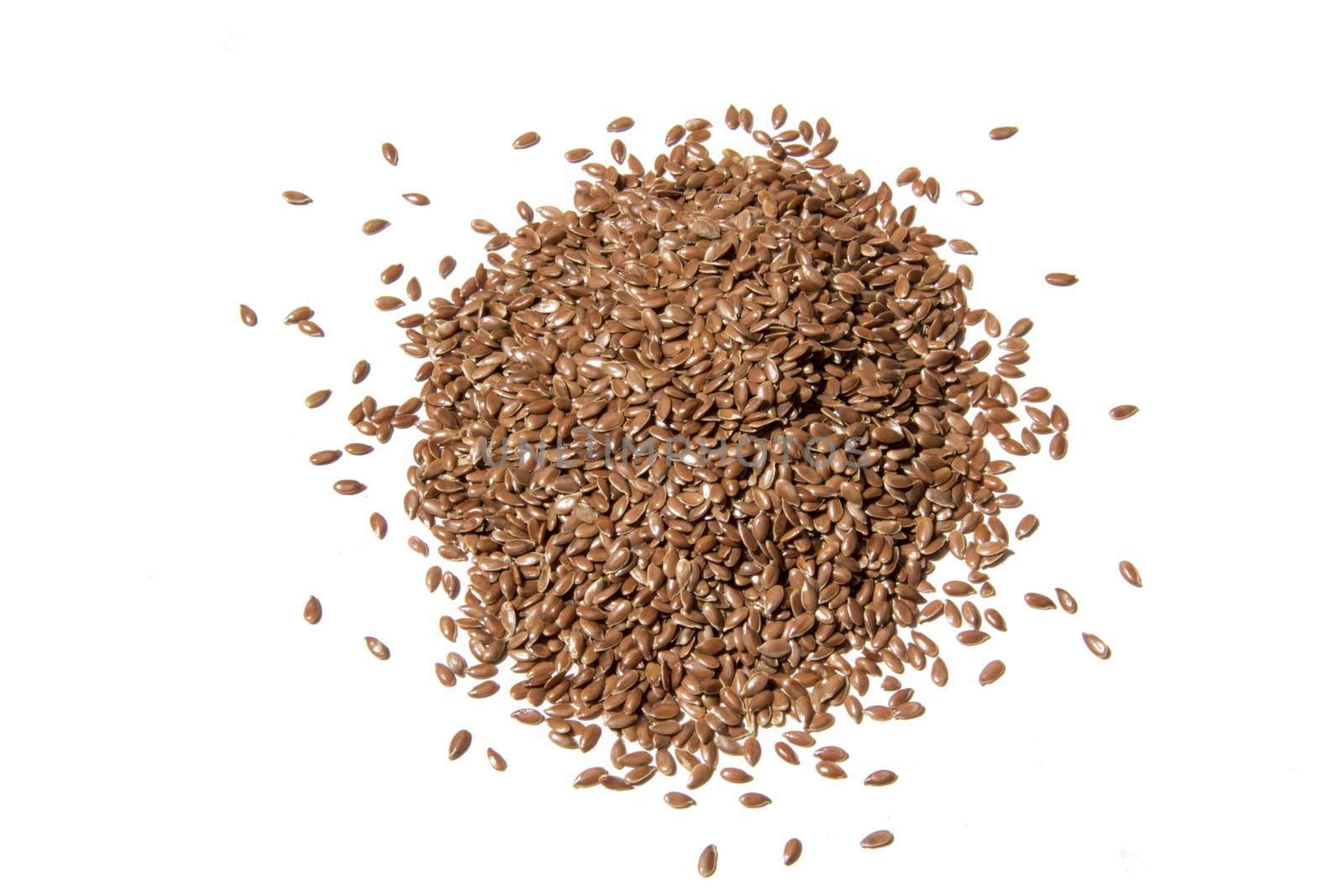 pile, heap of linseeds isolated on white background