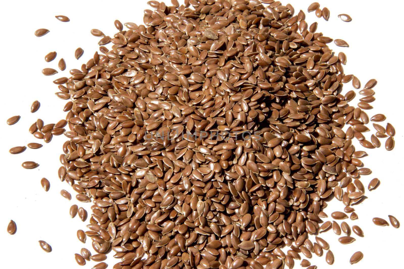 pile, heap of linseeds isolated on white background