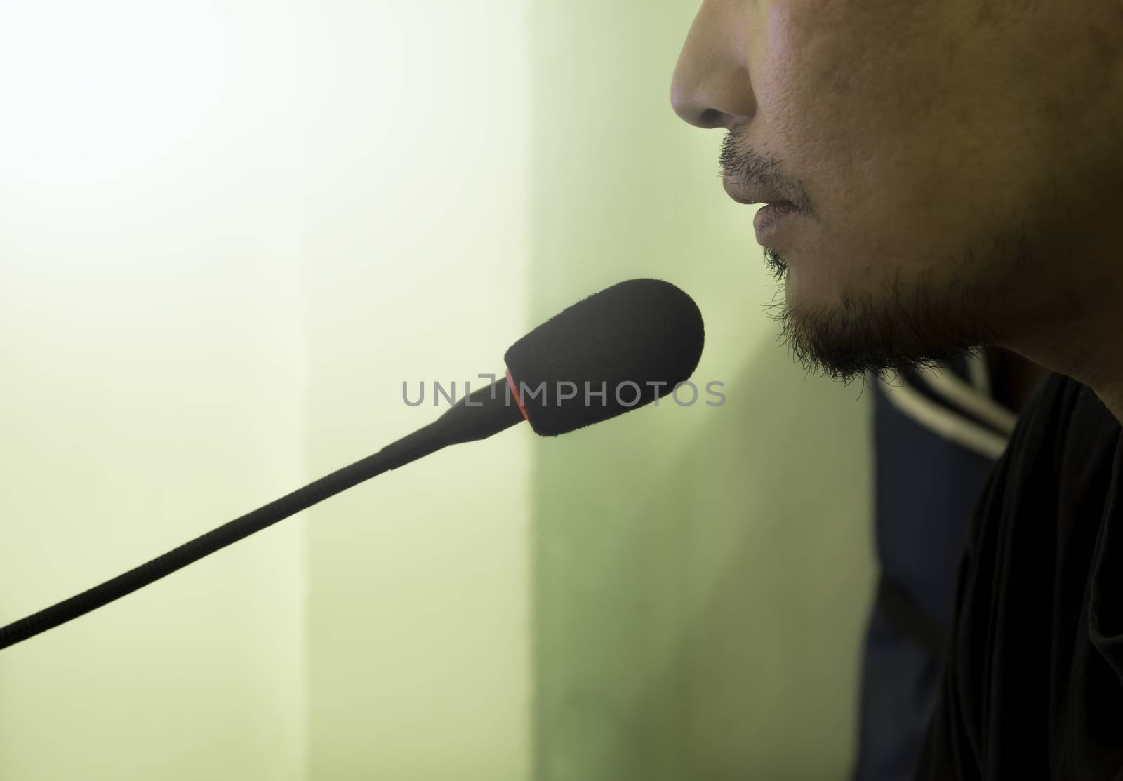 Male speech with microphone,The entertainer talking with microphone.
