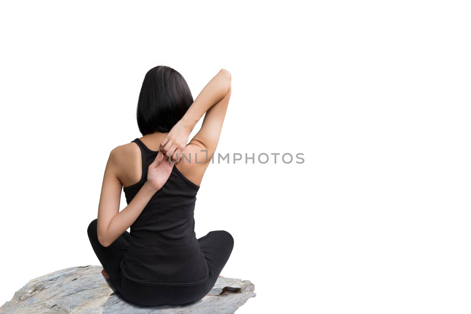 Close-up back of feminine and holding the hands together and crossed legs during meditation isolated on white background.