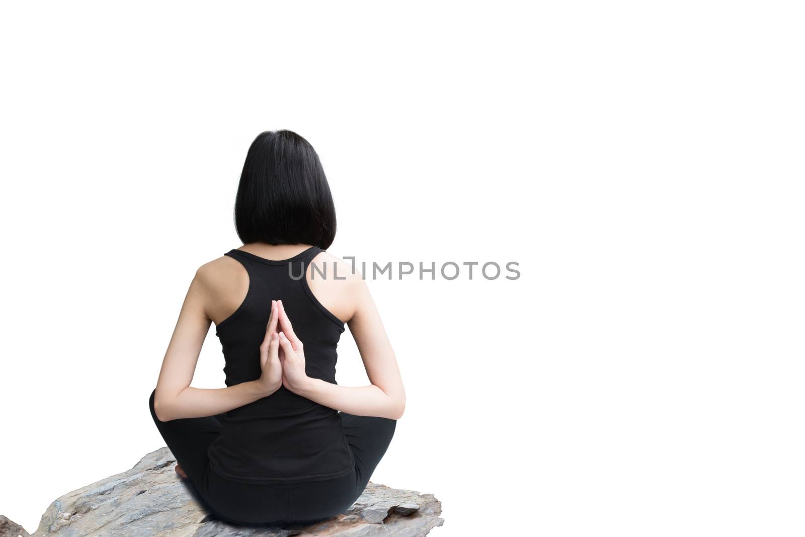 Close-up back of feminine and press the hands together and crossed legs during meditation isolated on white background.