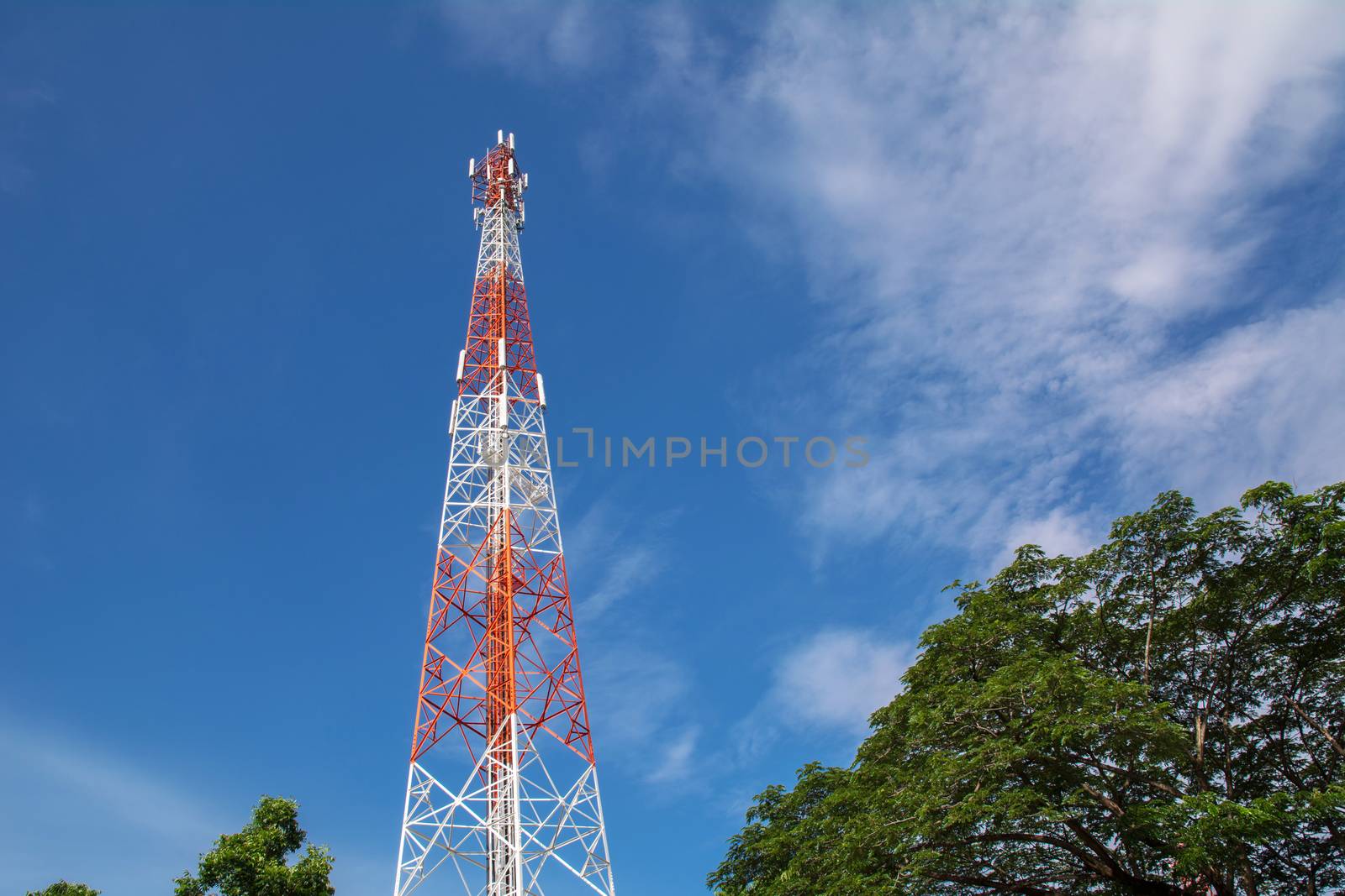 telecommunication mast TV antennas wireless technology under blue sky with cloud
