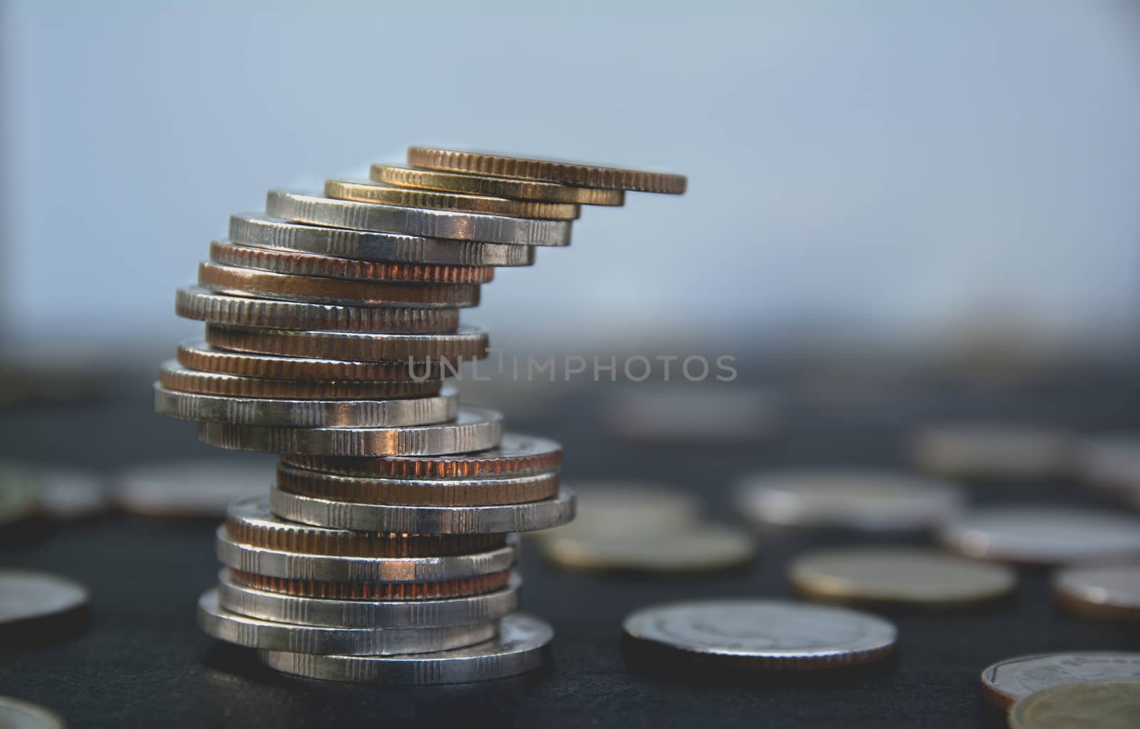 Closeup stack coin with blur background. Financial and saving co by kirisa99