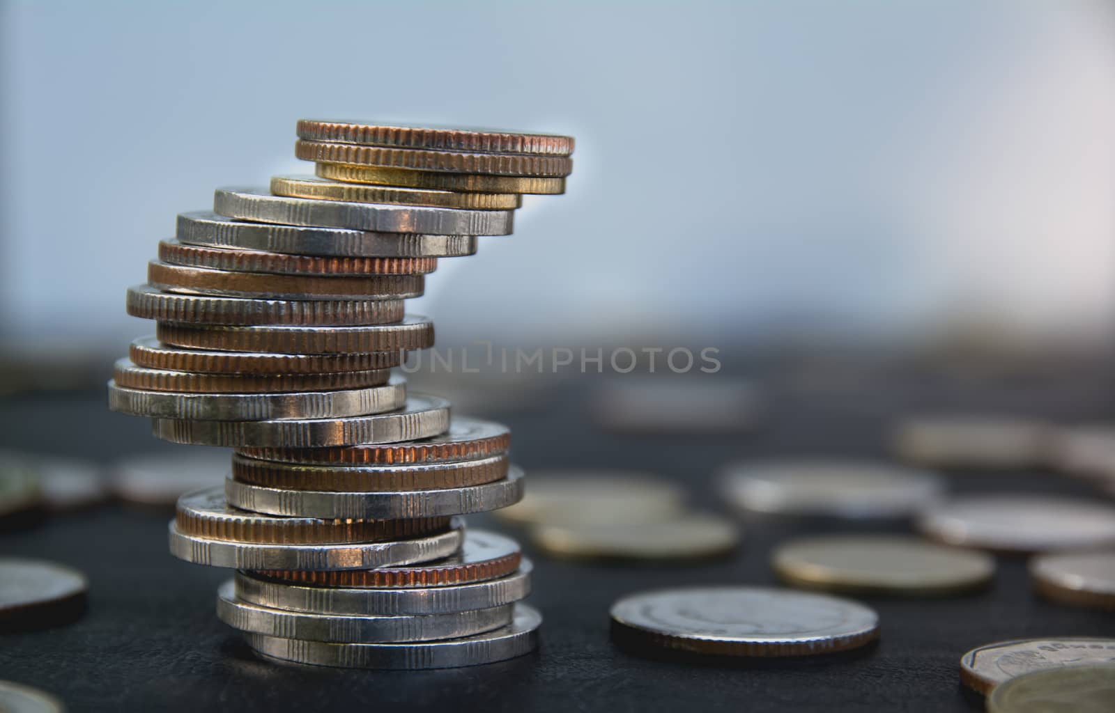 Closeup stack coin with blur background. Financial and saving co by kirisa99