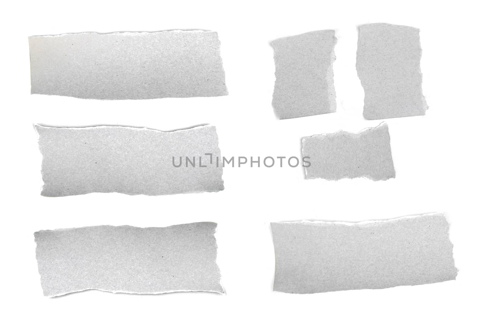 collection of white ripped pieces of paper isolated on white background. each one is shot separately