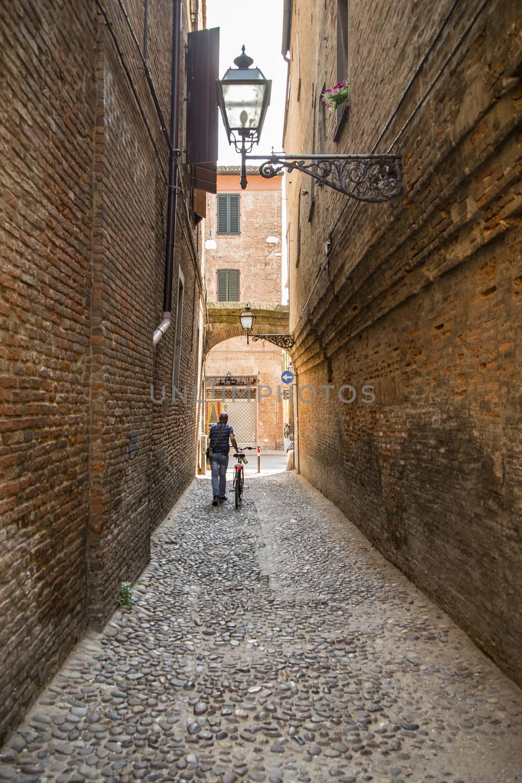 ancient medieval street in Ferrara by edella