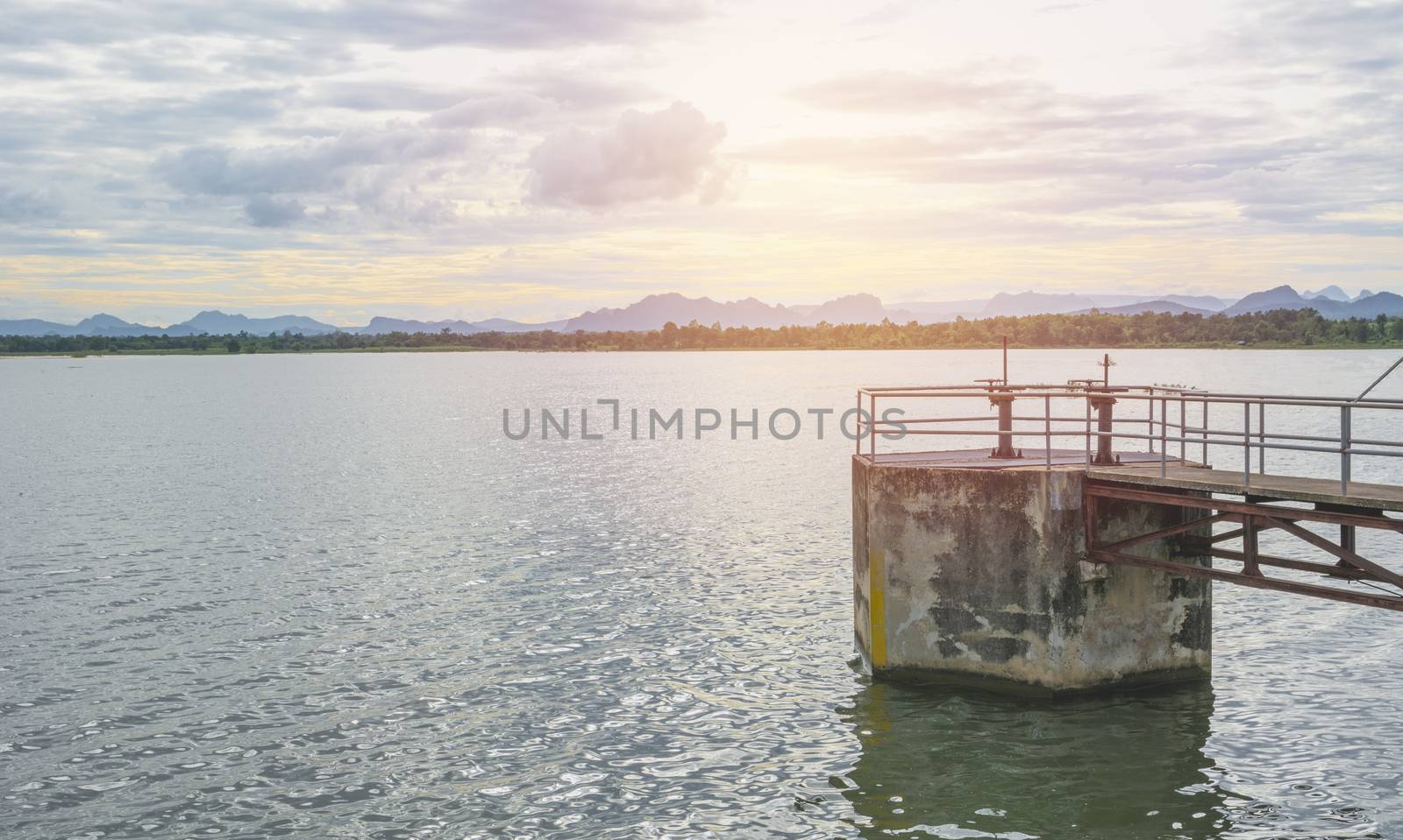 The floodgates on a dam in a river from in Thailand. Floodgate construction.