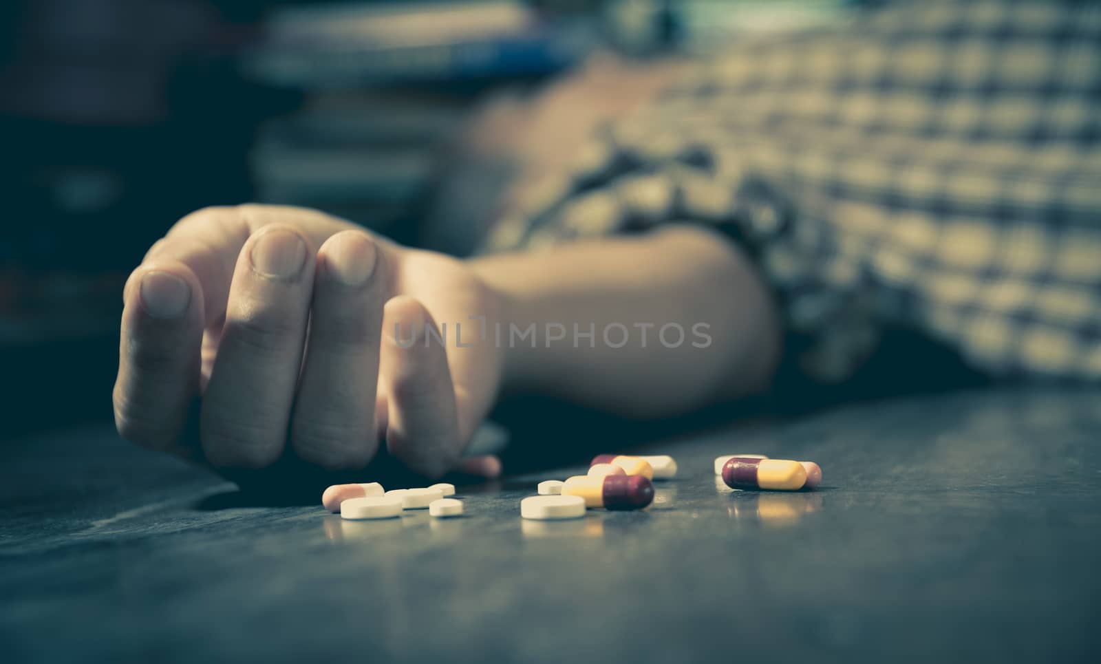 The man committing suicide by overdosing on medication. Close up by kirisa99