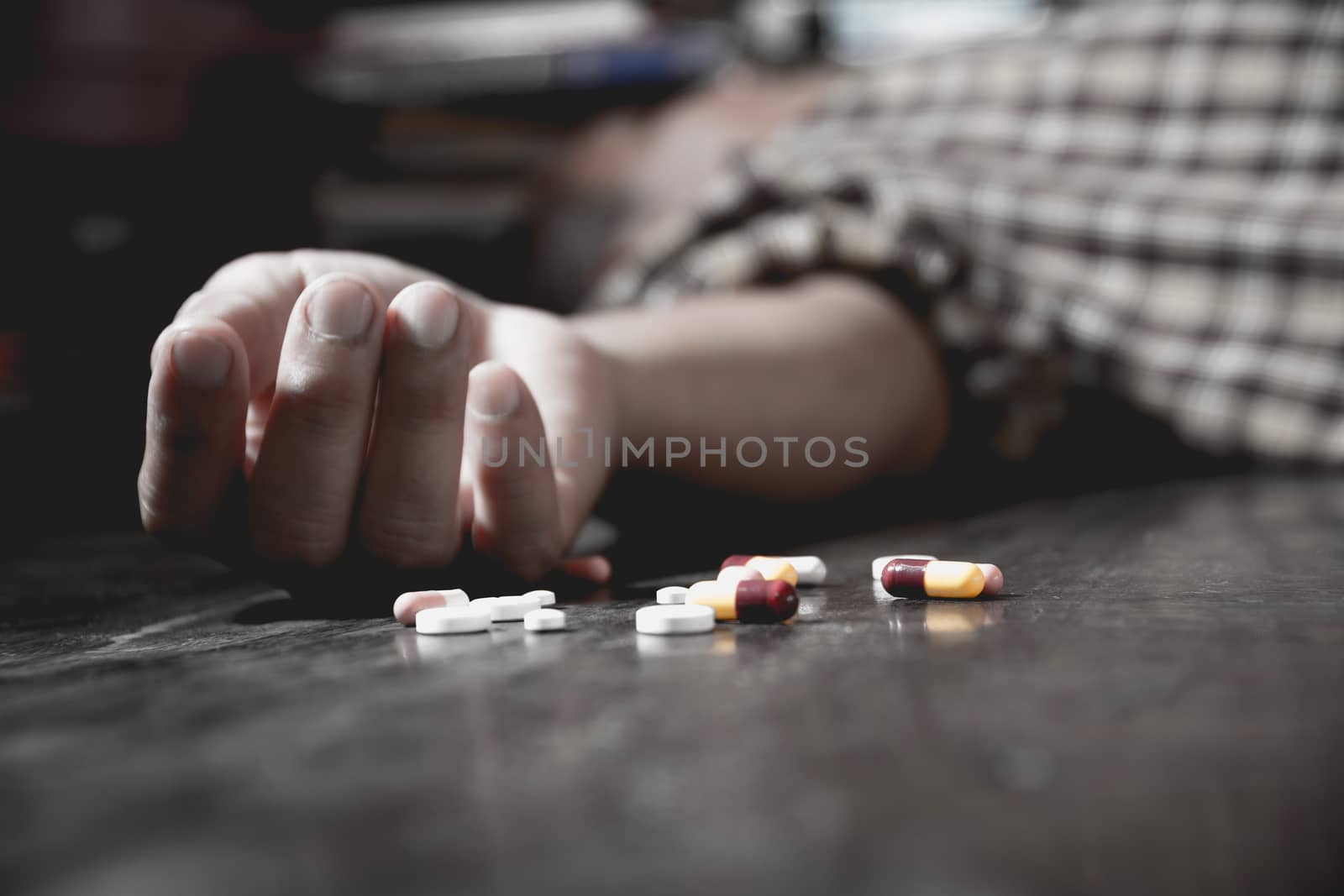 The man committing suicide by overdosing on medication. Close up by kirisa99