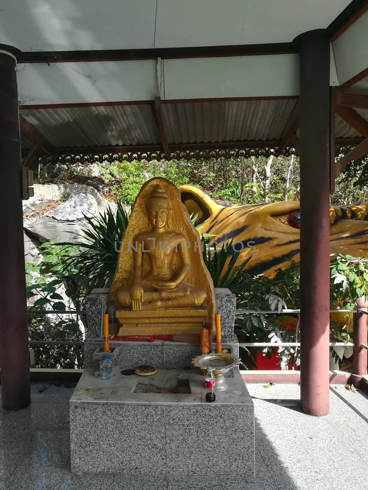 Worship Buddhist pavilion statue at Temple in Thailand  And his by shatchaya