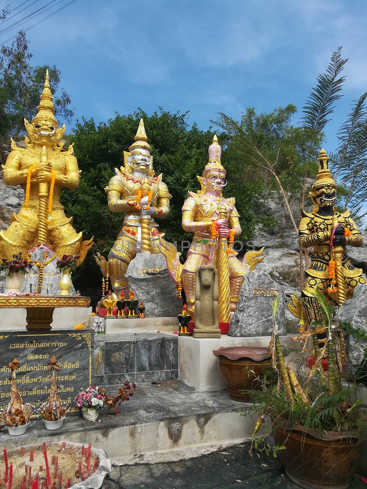 Worship Buddhist pavilion statue at Temple in Thailand  And his by shatchaya