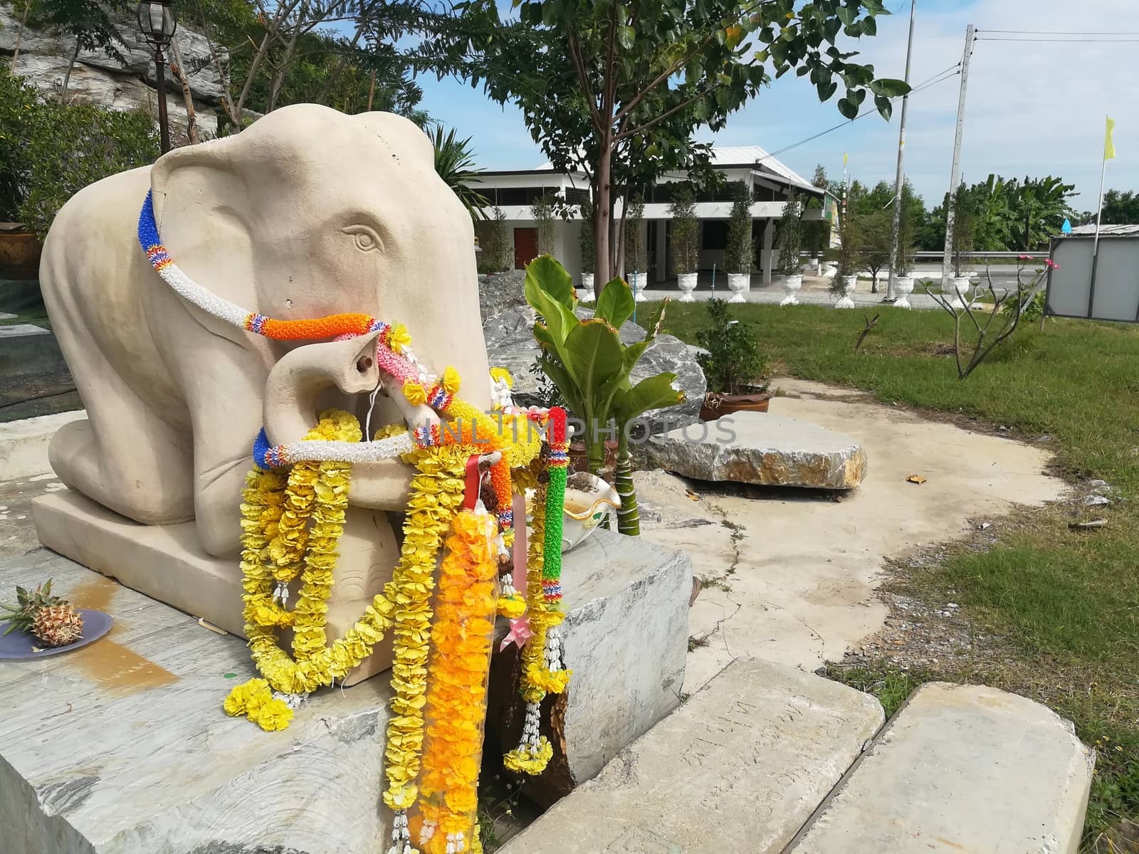 Worship Buddhist pavilion statue at Temple in Thailand  And his by shatchaya