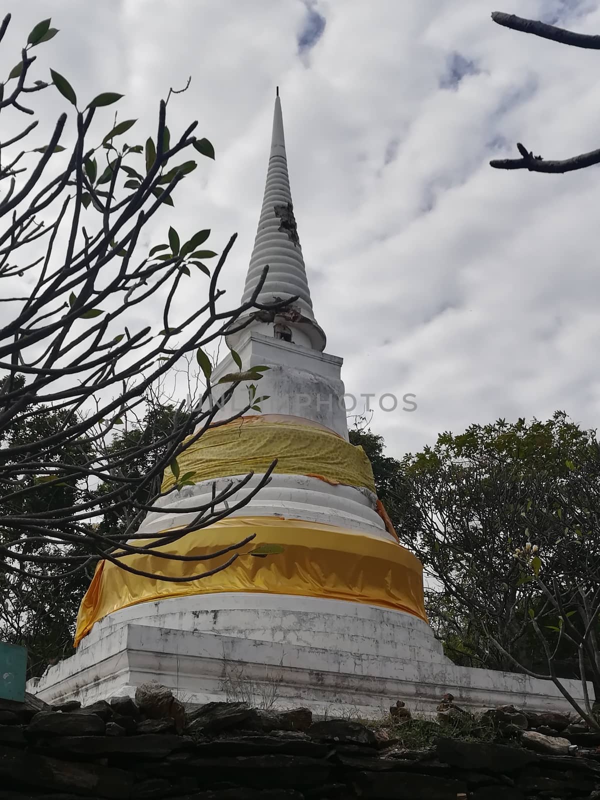 Worship Buddhist pavilion statue at Temple in Thailand  And his by shatchaya