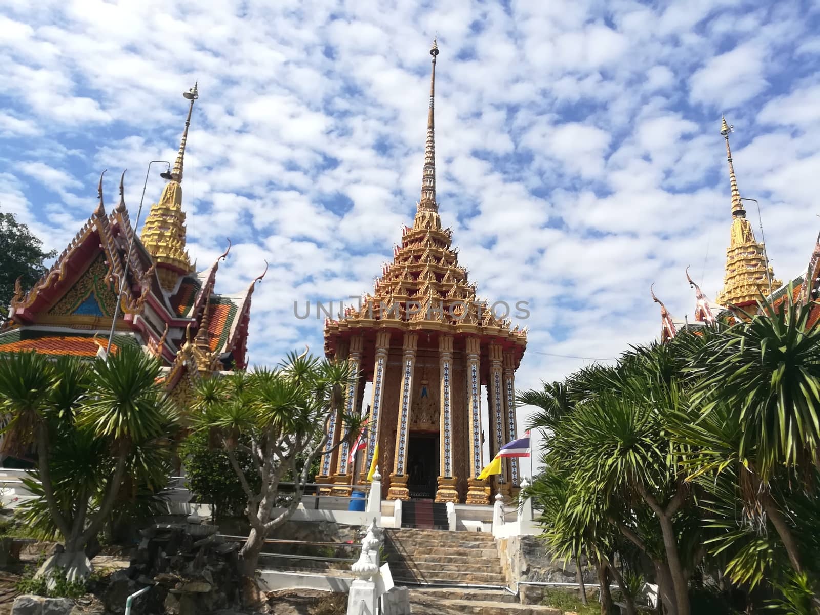 Worship Buddhist pavilion statue at Temple in Thailand  And his by shatchaya