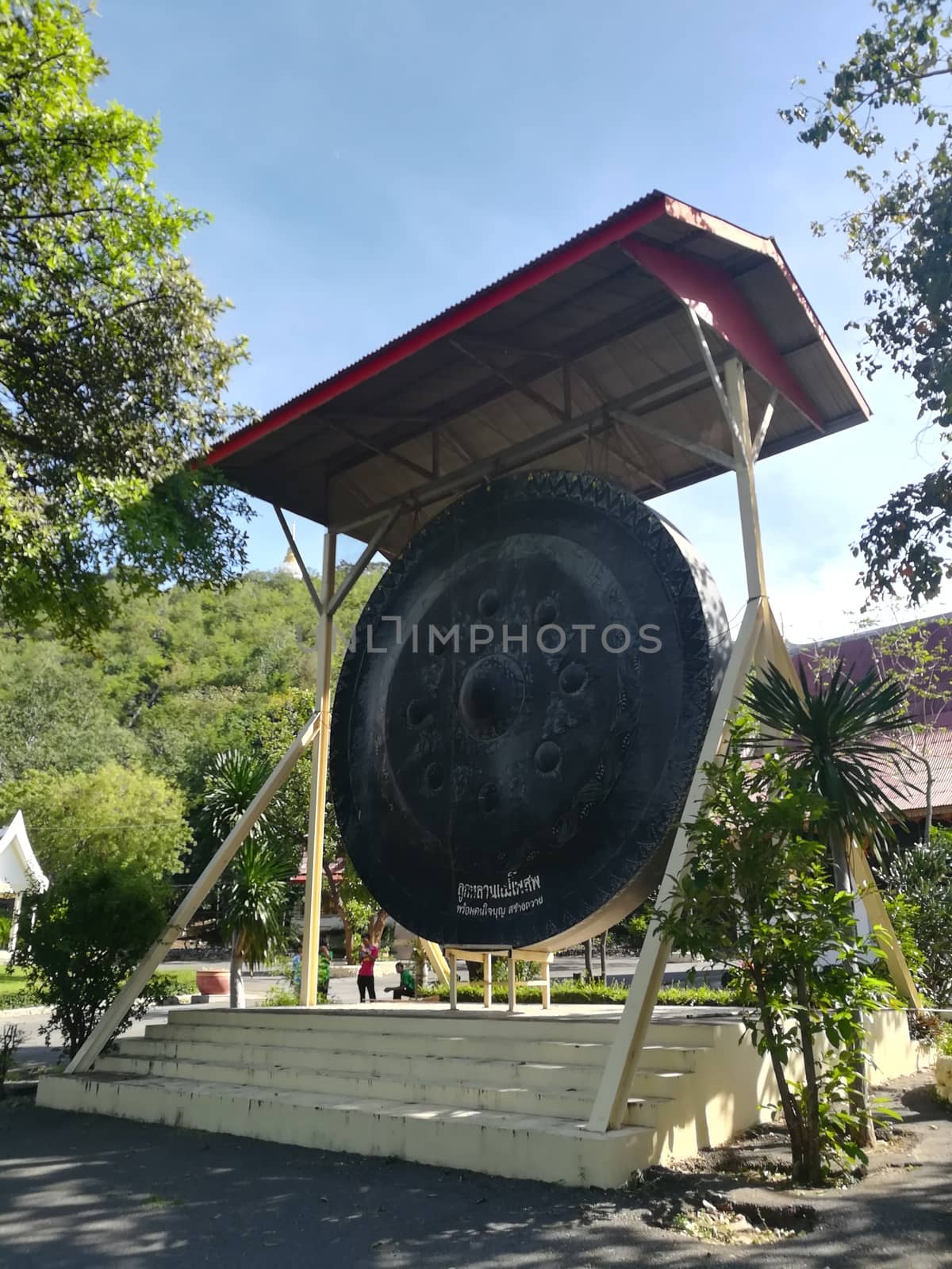 Worship Buddhist pavilion statue at Temple in Thailand  And his by shatchaya