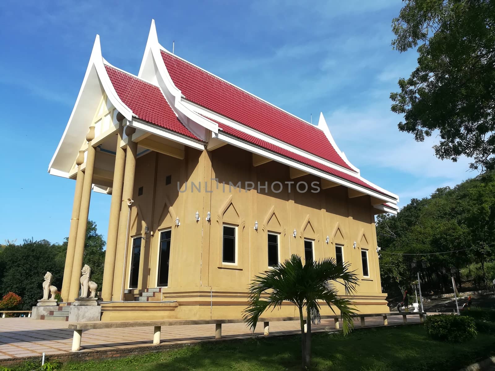 Worship Buddhist pavilion statue at Temple in Thailand  And his by shatchaya