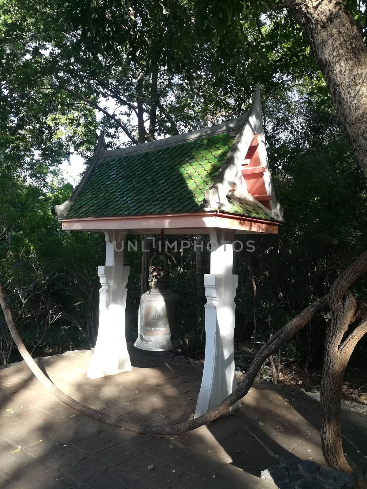 Worship Buddhist pavilion statue at Temple in Thailand  And his by shatchaya