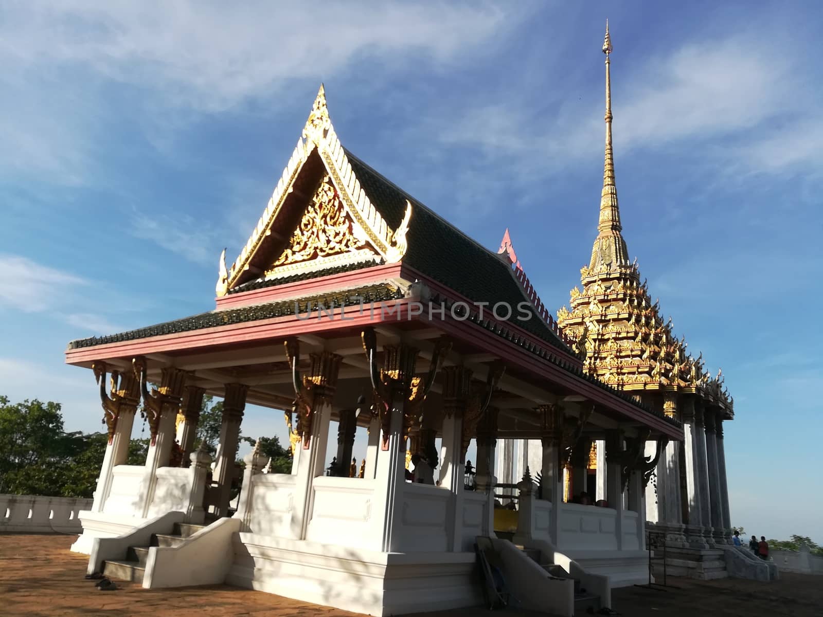 Worship Buddhist pavilion statue at Temple in Thailand  And his by shatchaya