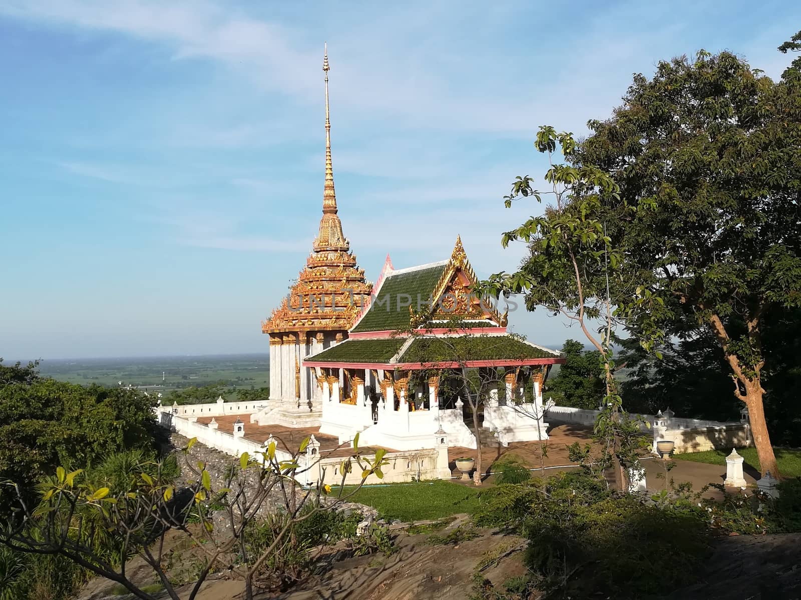 Worship Buddhist pavilion statue at Temple in Thailand  And his by shatchaya