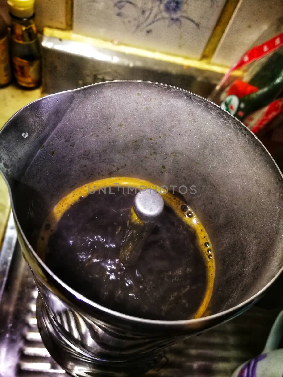 water of a coffee boiling in a coffee pot