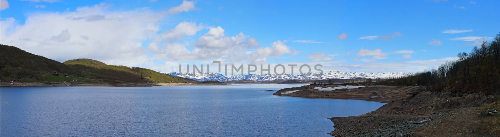 Spring arctic landscape with mountains, lake and tundra, sunny day, Mosvatn, Norway