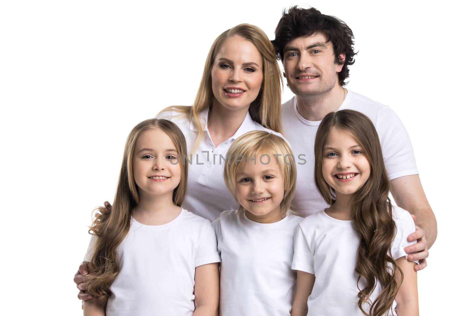 Portrait of happy smiling family of two parents and three children isolated on white background