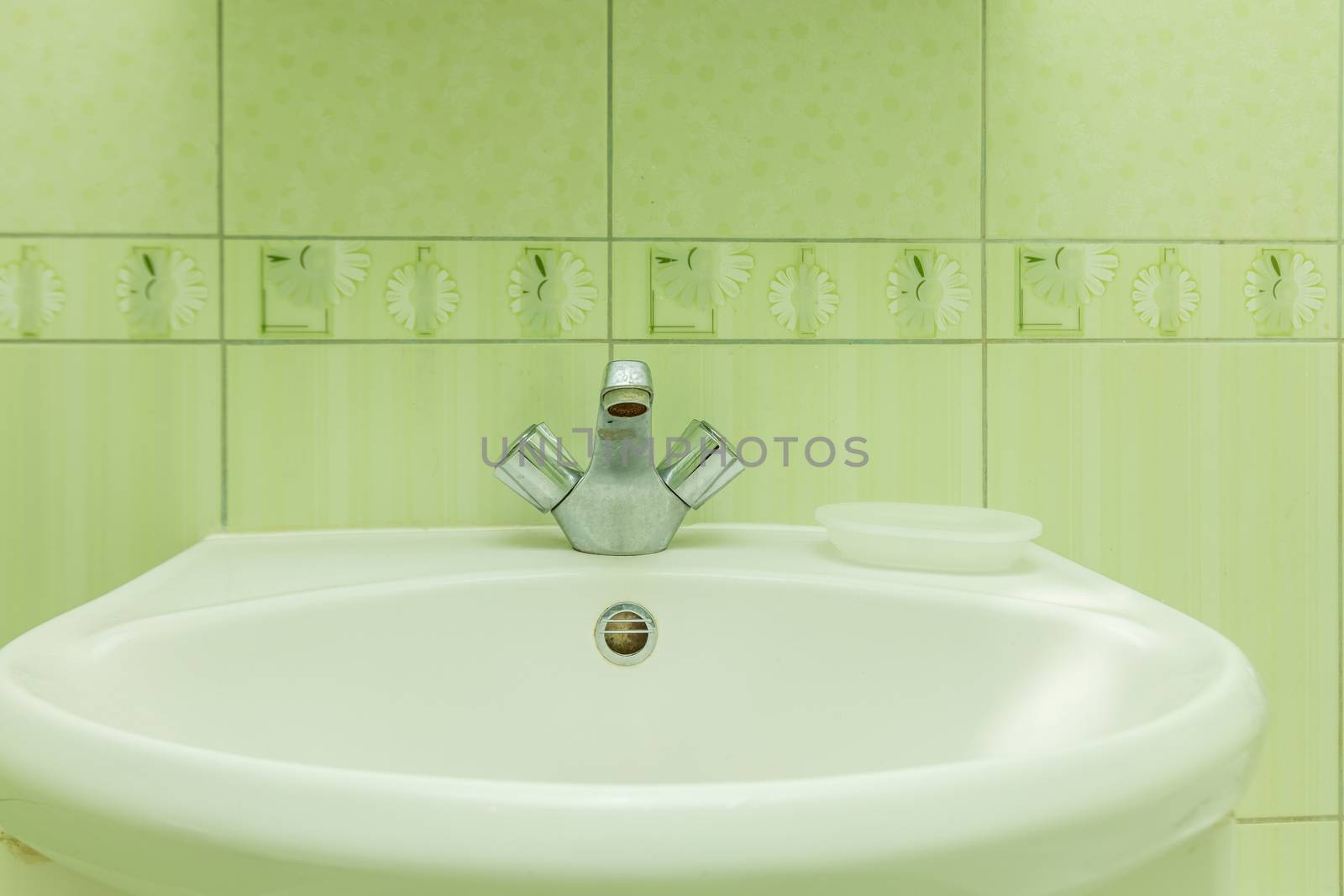Faucet in bathroom by olga_sweet