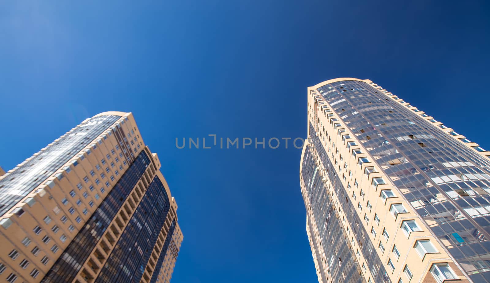 Modern building exterior low angle view with blue sky