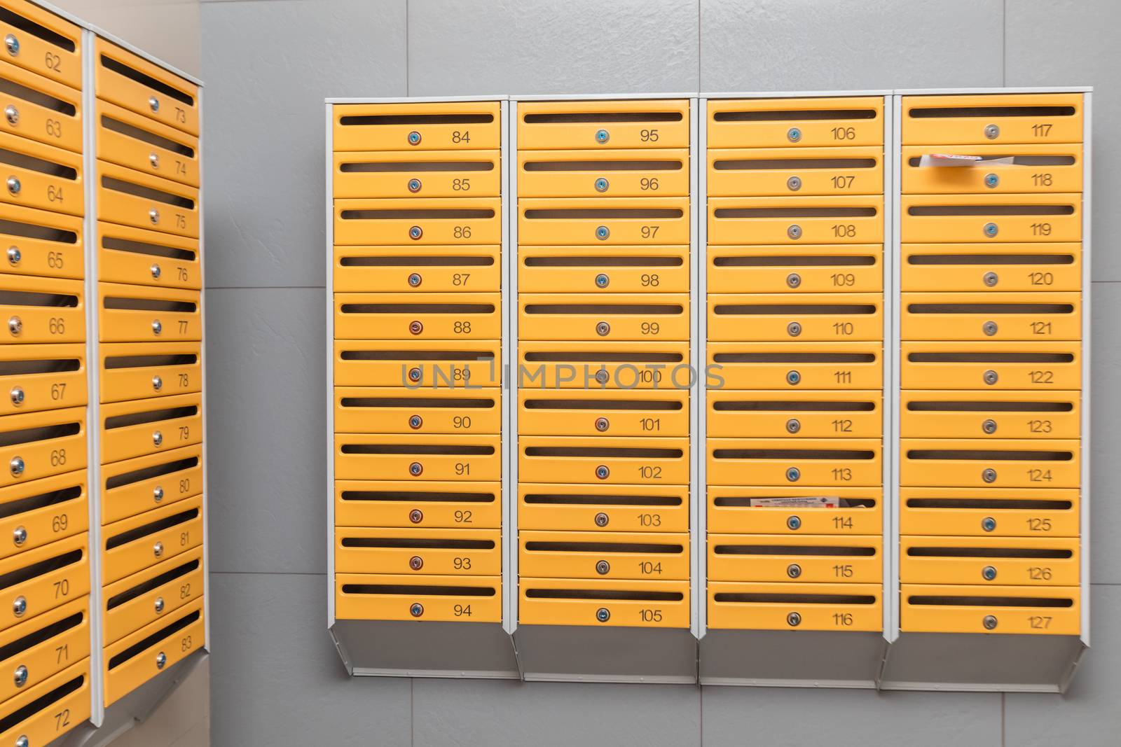 Rows of metal mailboxes by olga_sweet