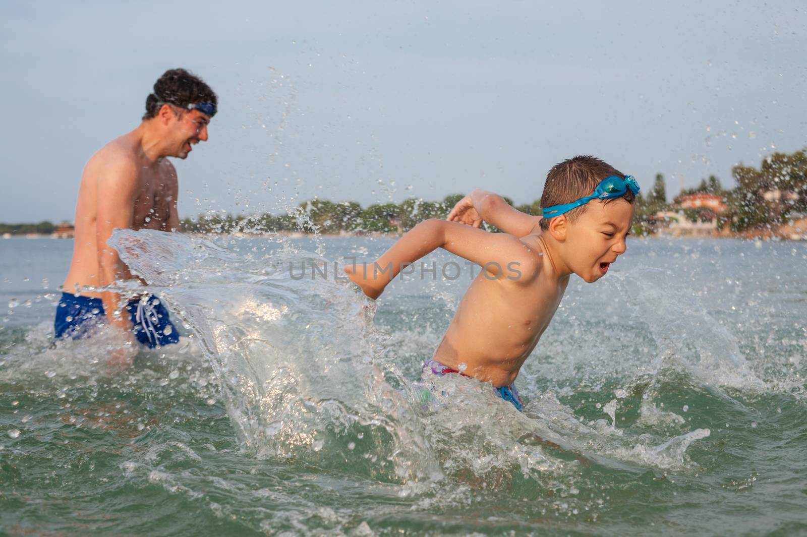 Boy Son Father Play Sea Splashing by vilevi