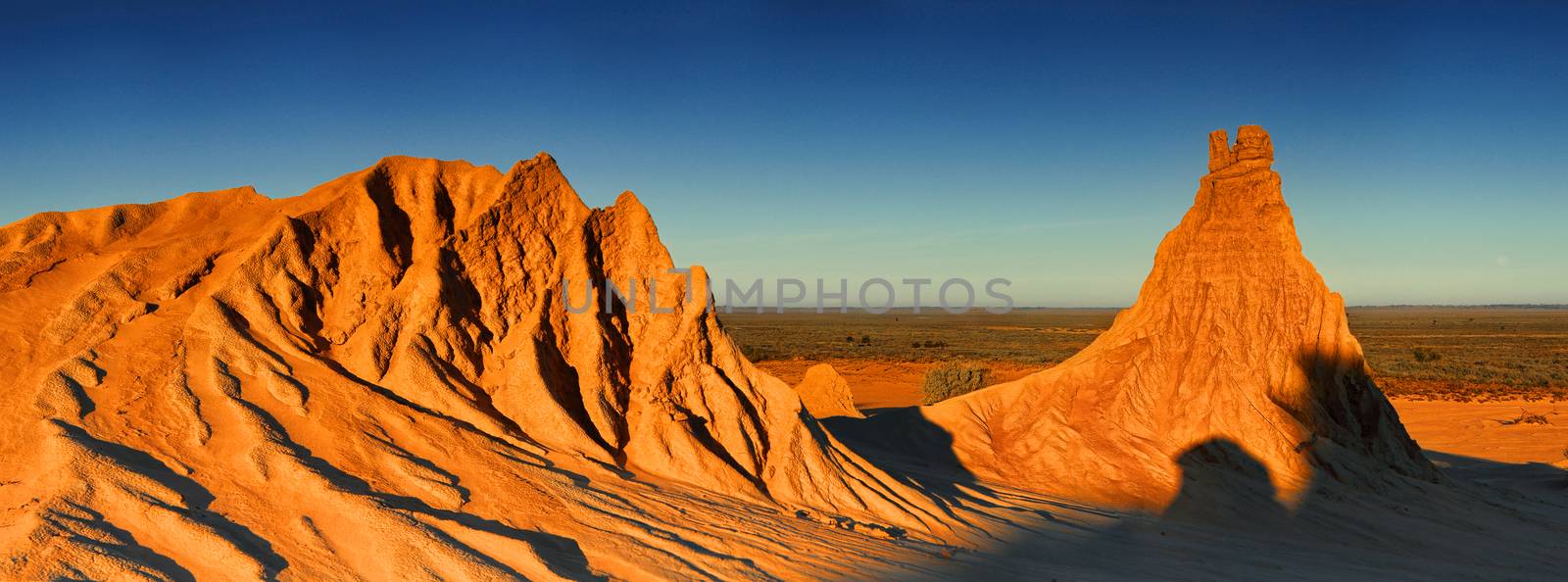 Inland Australia desert landscape in late afternoon winter light. Three image stitched panorama