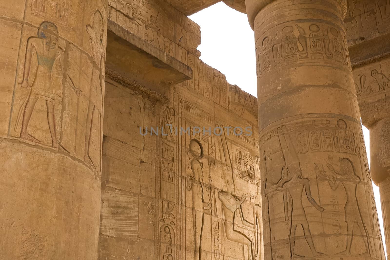 Egyptian hieroglyphs and drawings on the walls and columns. Egyptian language, The life of ancient gods and people in hieroglyphics and drawings