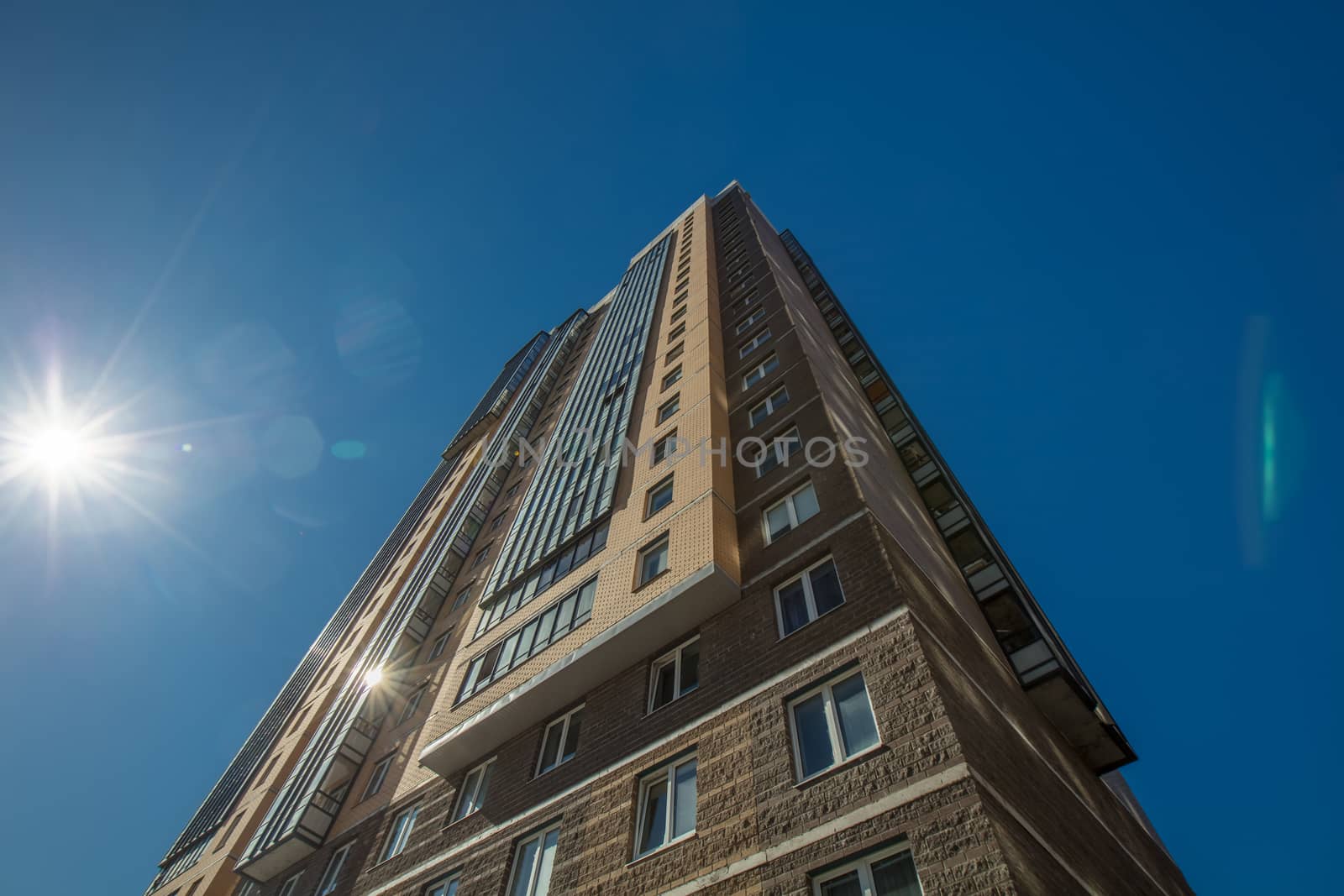 Modern building exterior low angle view with blue sky