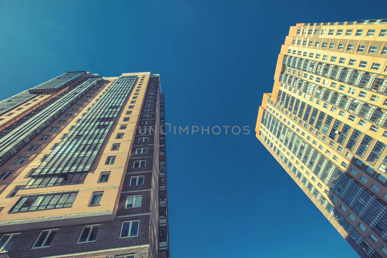 Modern building exterior low angle view with blue sky