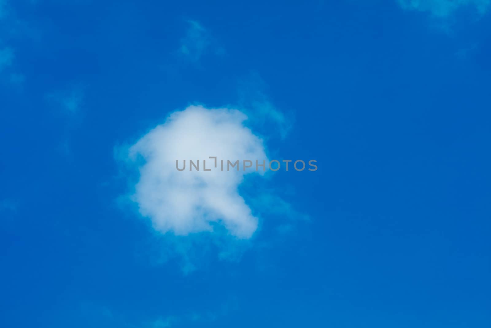 One simple cloud on sky in summer sunny day clean concept