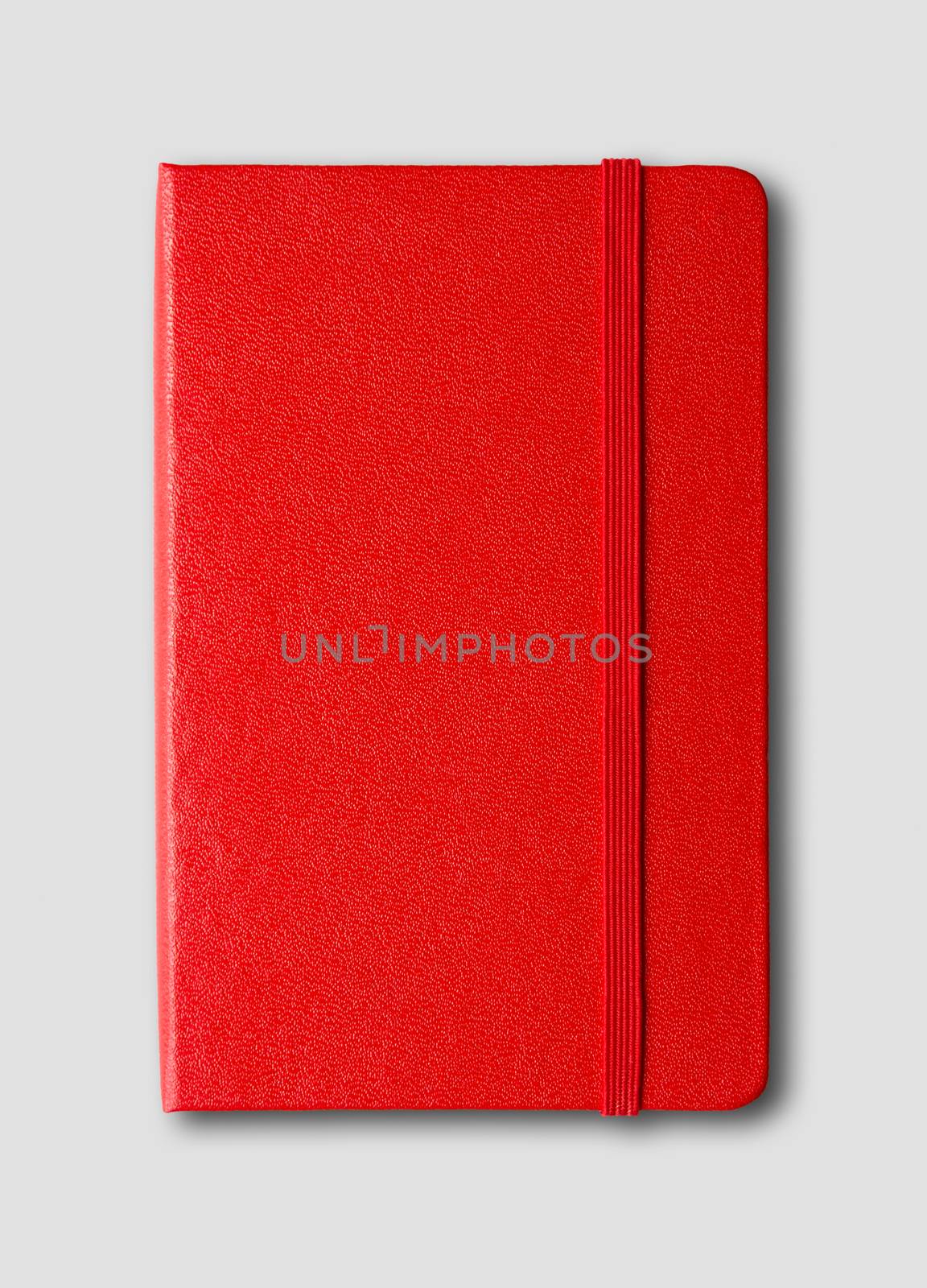 Red closed notebook mockup isolated on grey