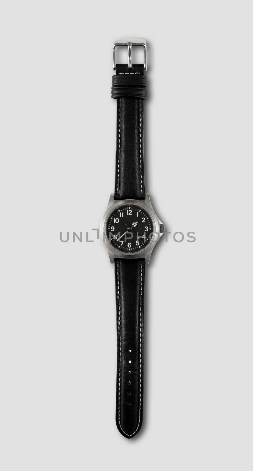 Black wrist watch isolated on grey background
