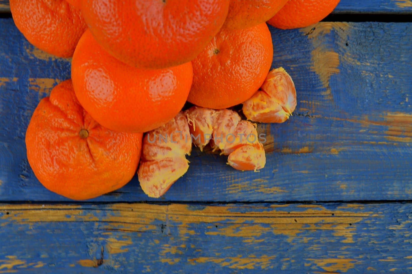 Tangerines on wooden background. Healthy and diet concept. 