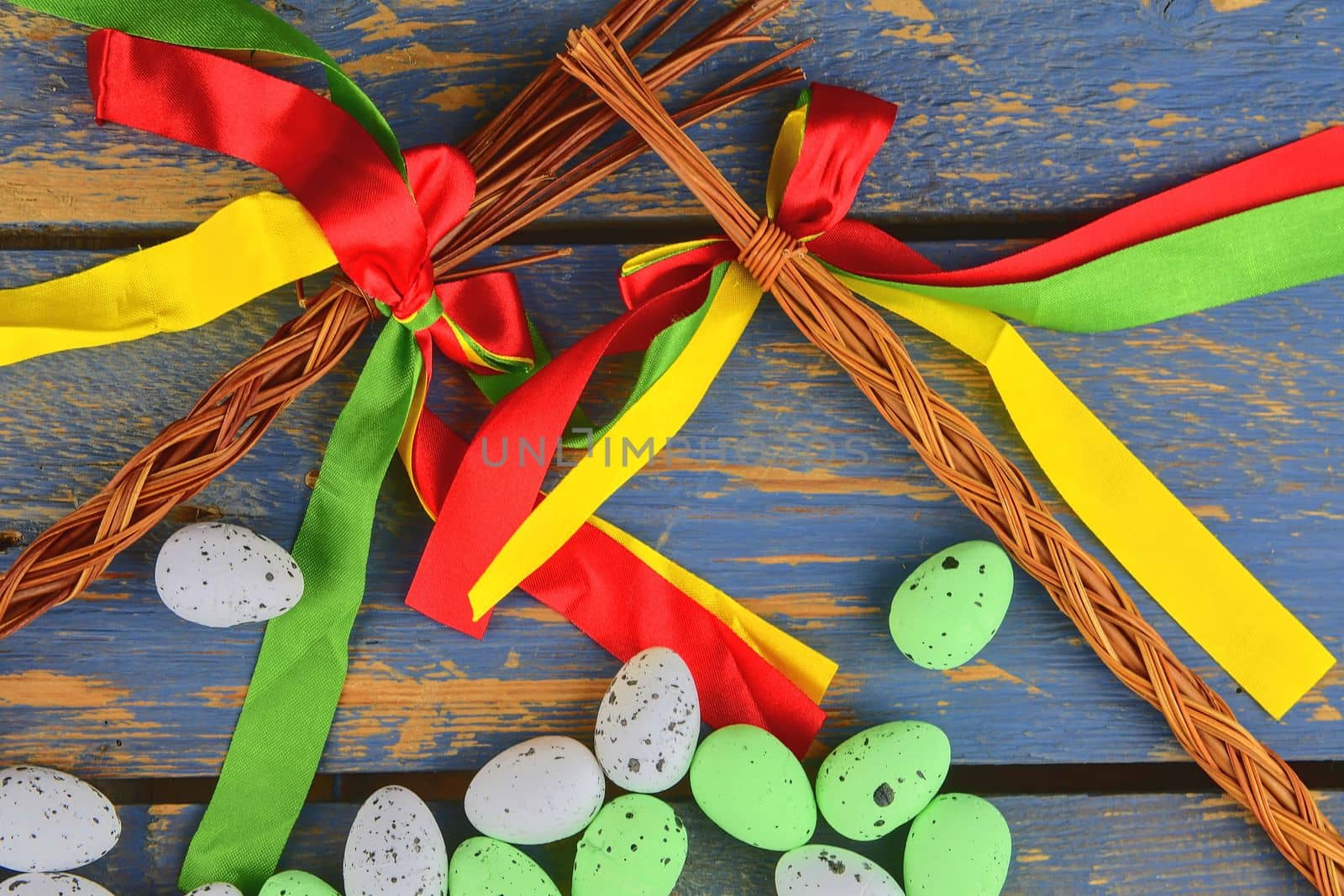 Easter eggs on wooden background. Czech concept. Colour ribbons and Easter theme by roman_nerud