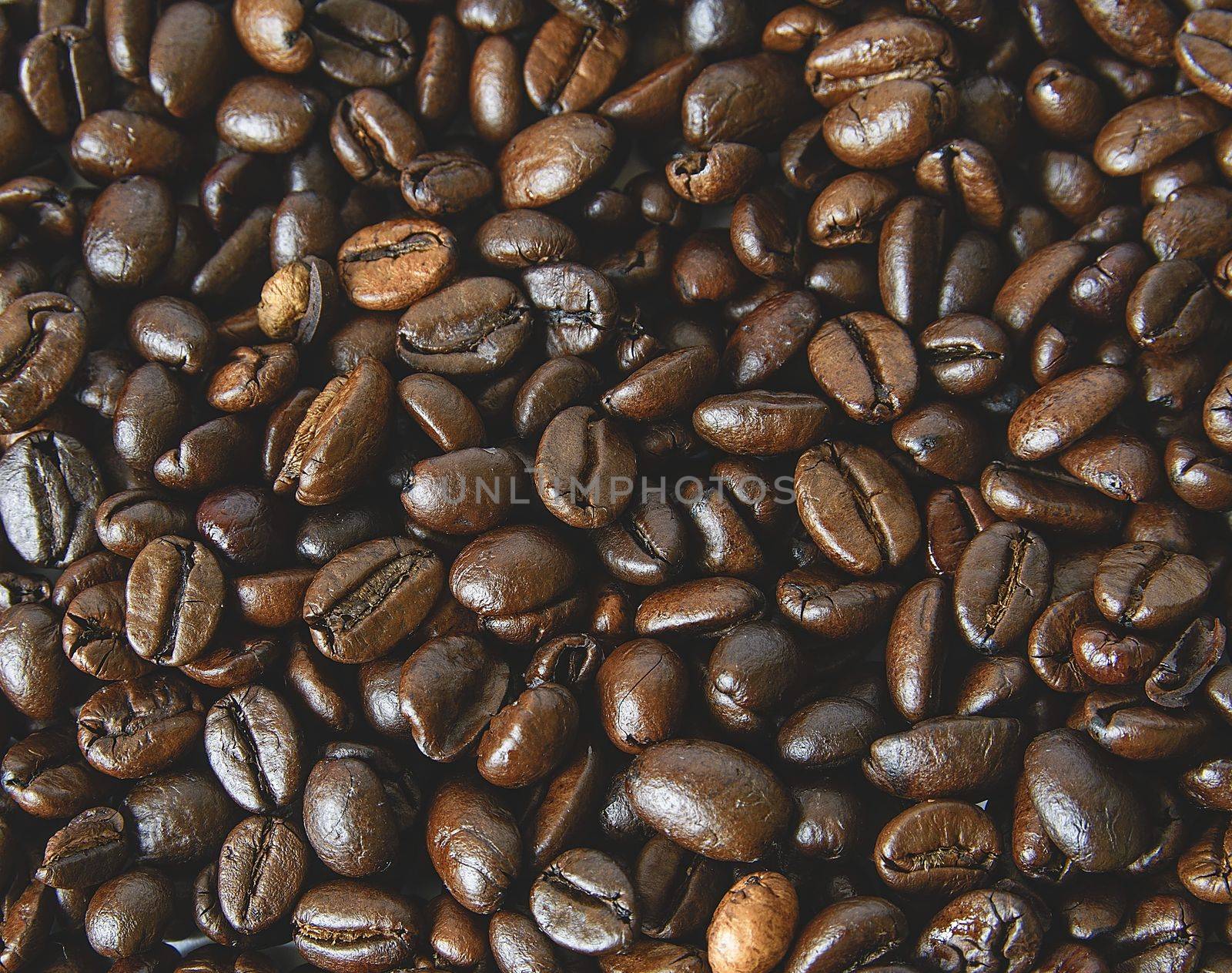 Coffee beans texture. Coffee background.  Close-up of coffee background. by roman_nerud