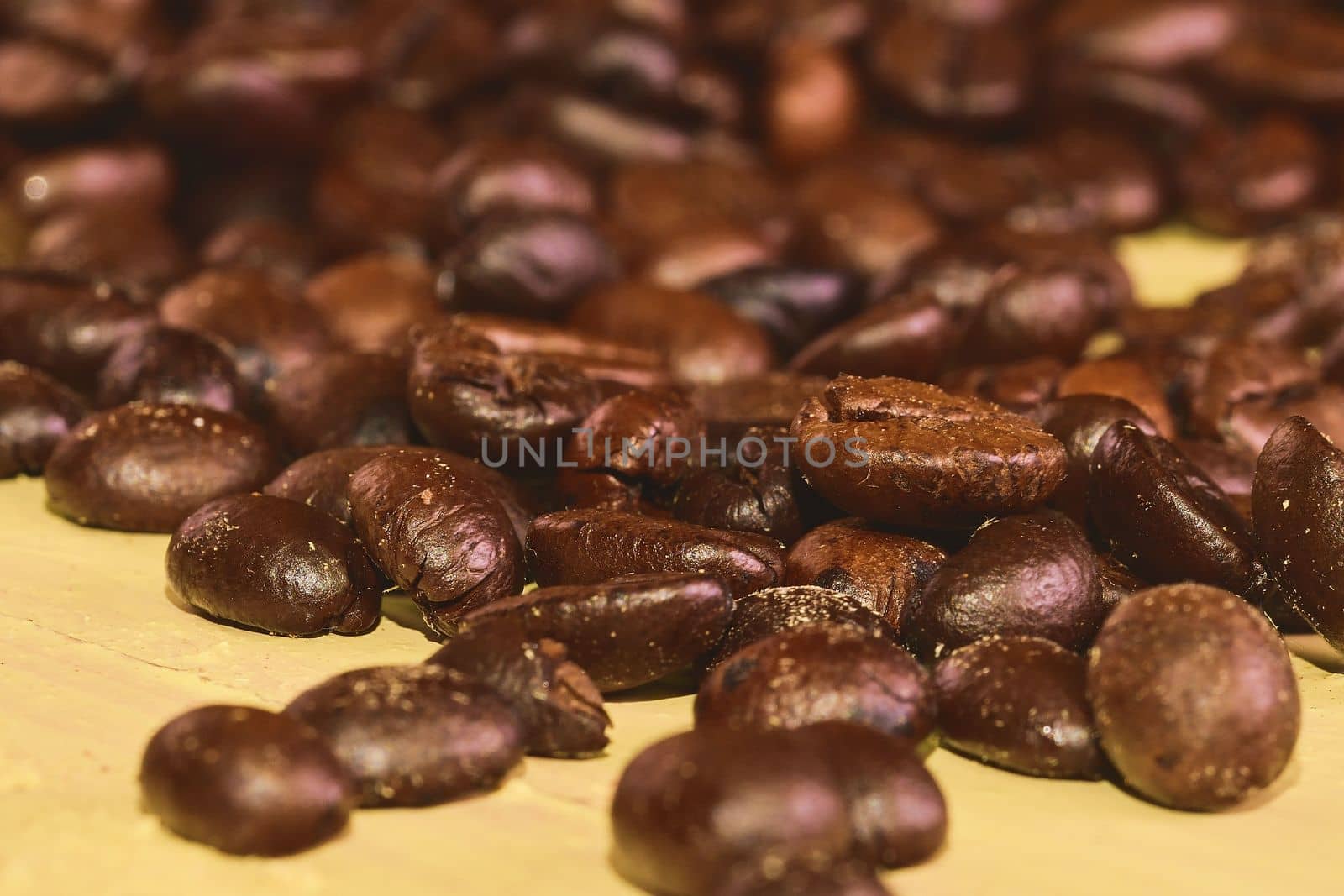 Coffee beans on white background. Close-up. Macro image by roman_nerud