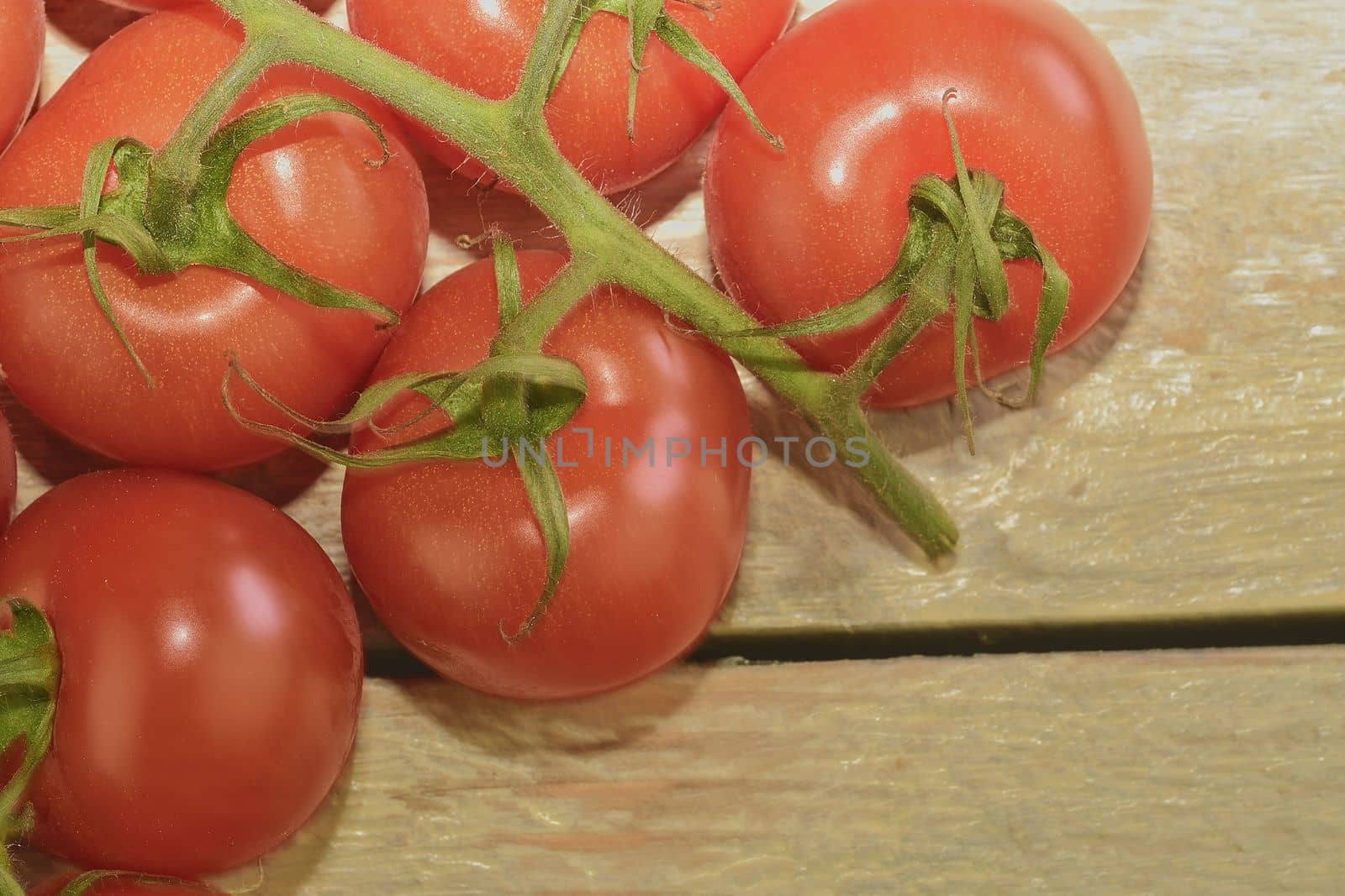 Fresh cherry tomatoes on rustic wooden white background. White background. Close-up by roman_nerud